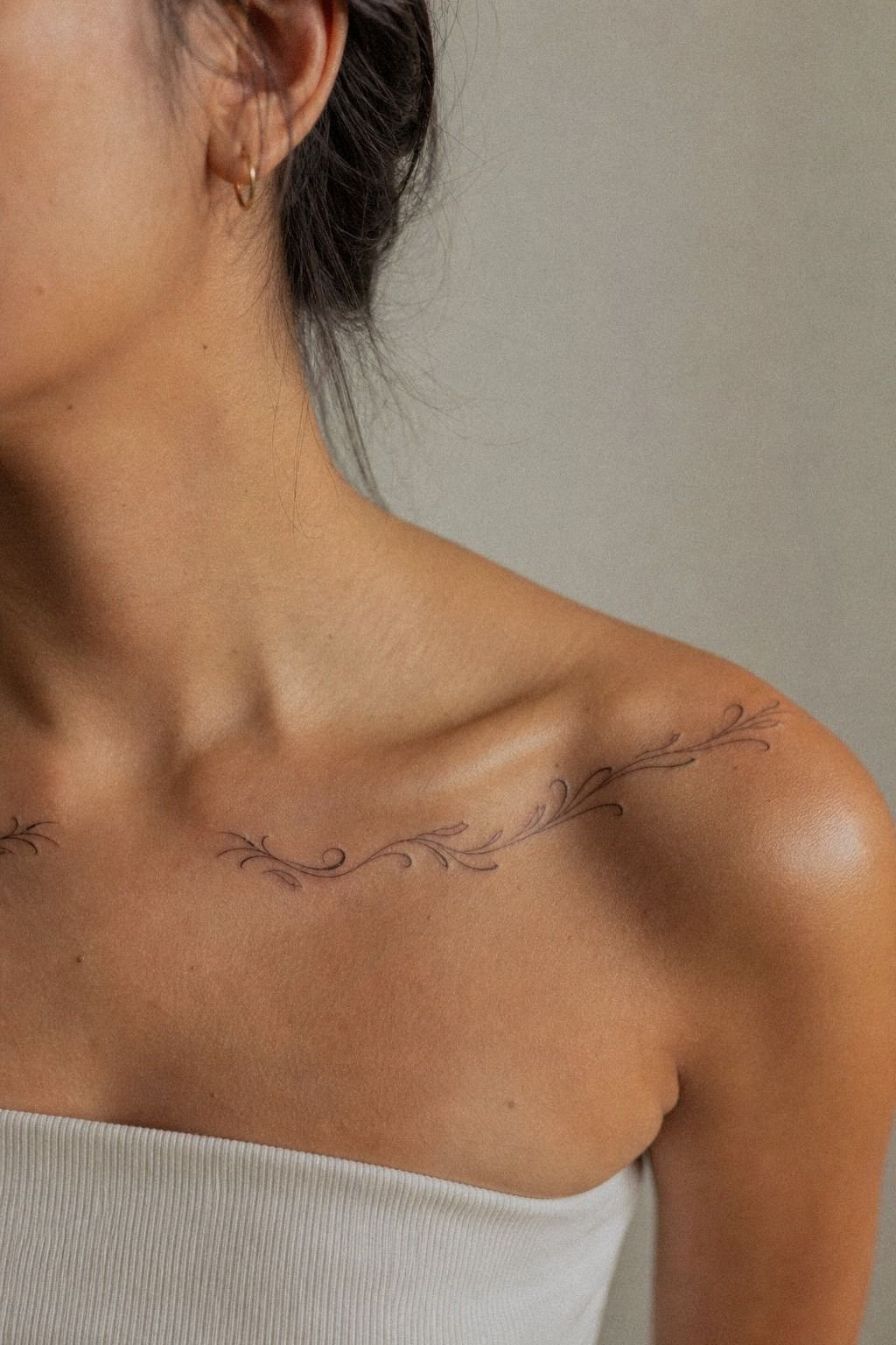 Place Lettering Above The Collarbone Bone