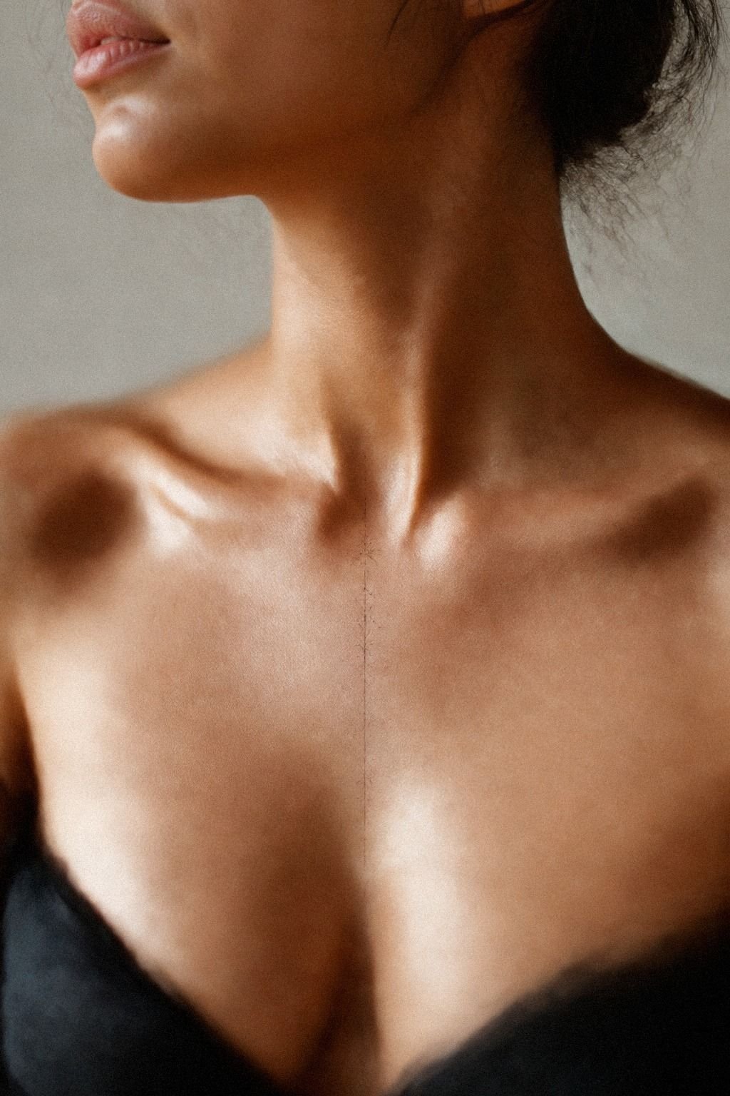 Place a Tiny Sternum Tattoo Around Your Center Line