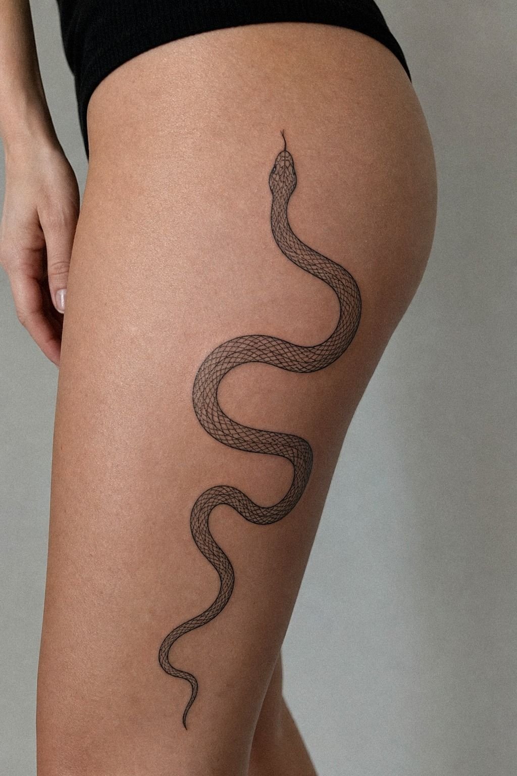 I Added A Snake Curve Around My Thigh