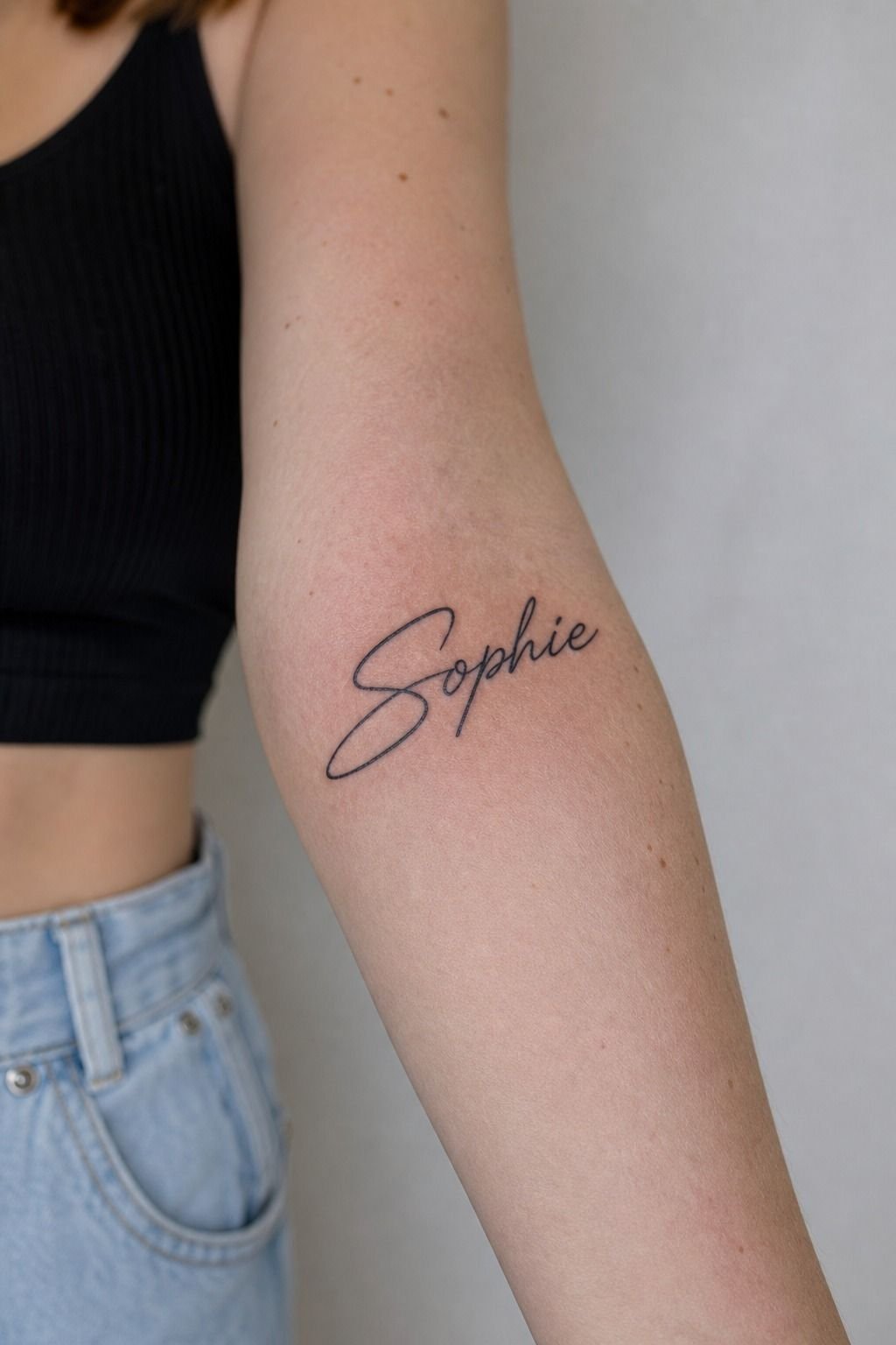 Choose a Timeless Script Girlfriend Name Forearm Tattoo