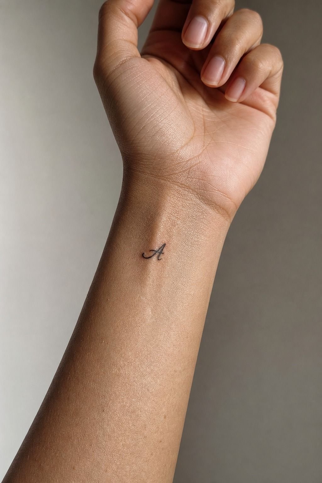 Keep a Minimal Girlfriend Initial Wrist Tattoo Legible