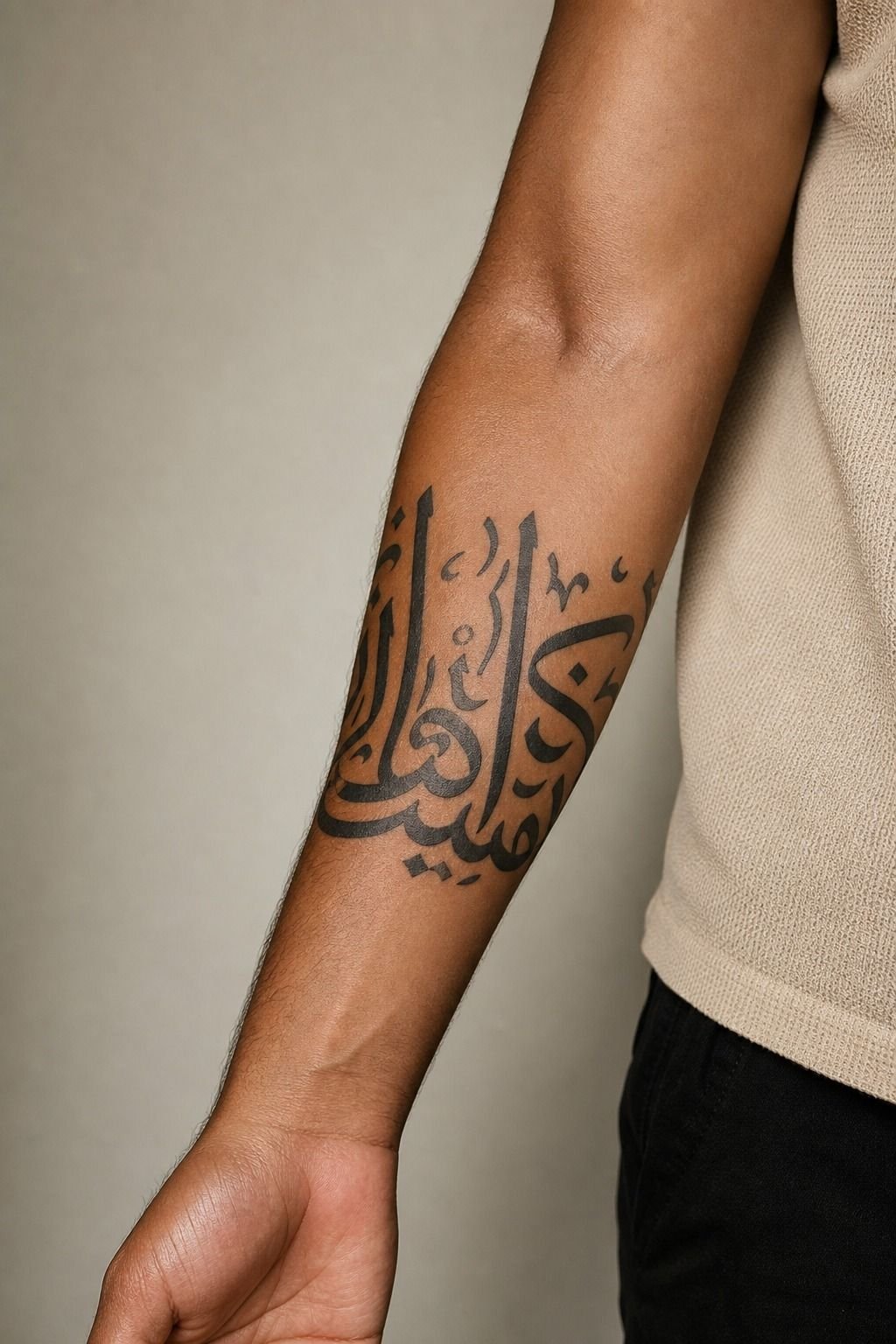Bold Forearm Lettering Against Whisper-Thin Script