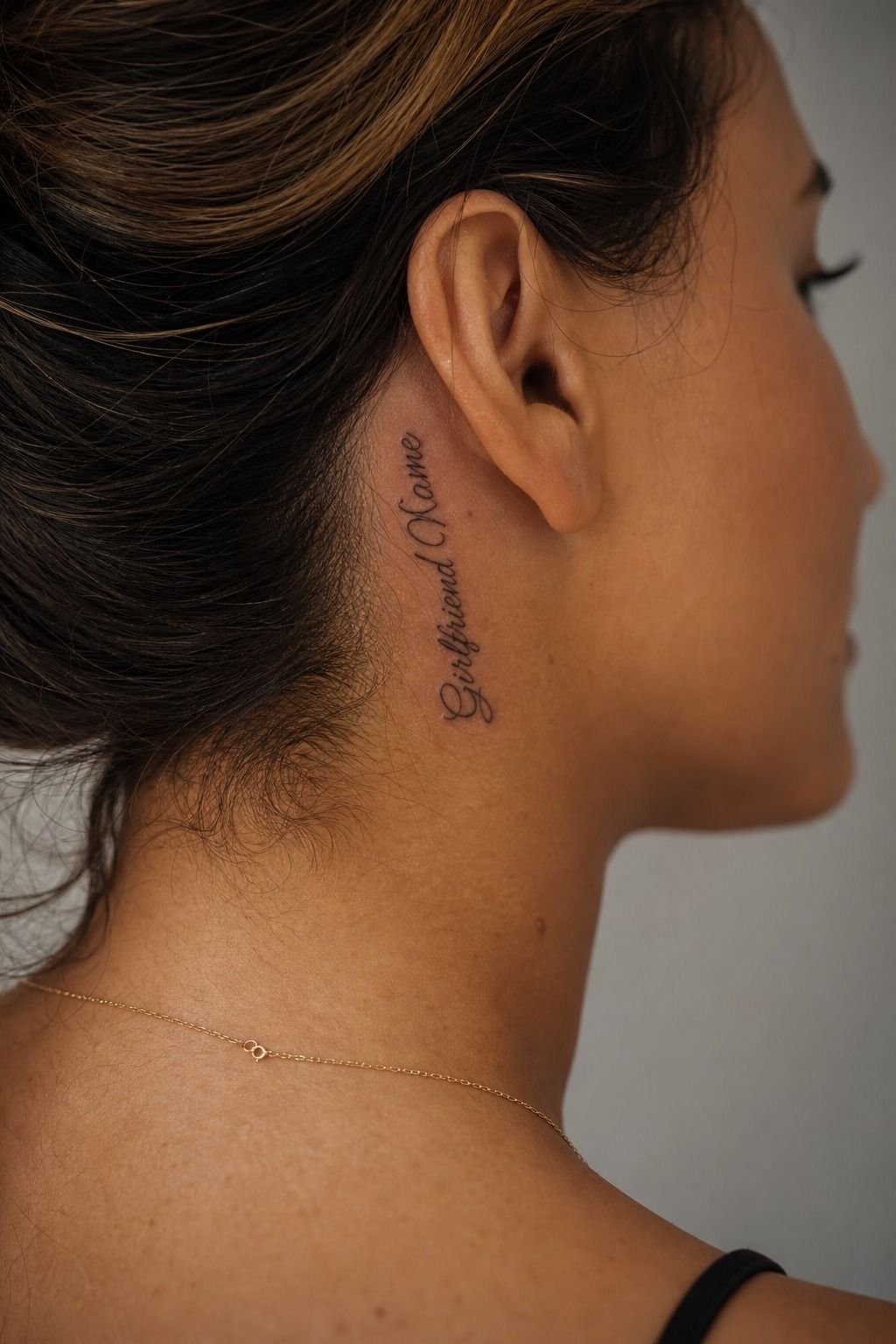 Why Does a Subtle Girlfriend Name Behind Ear Tattoo Work?