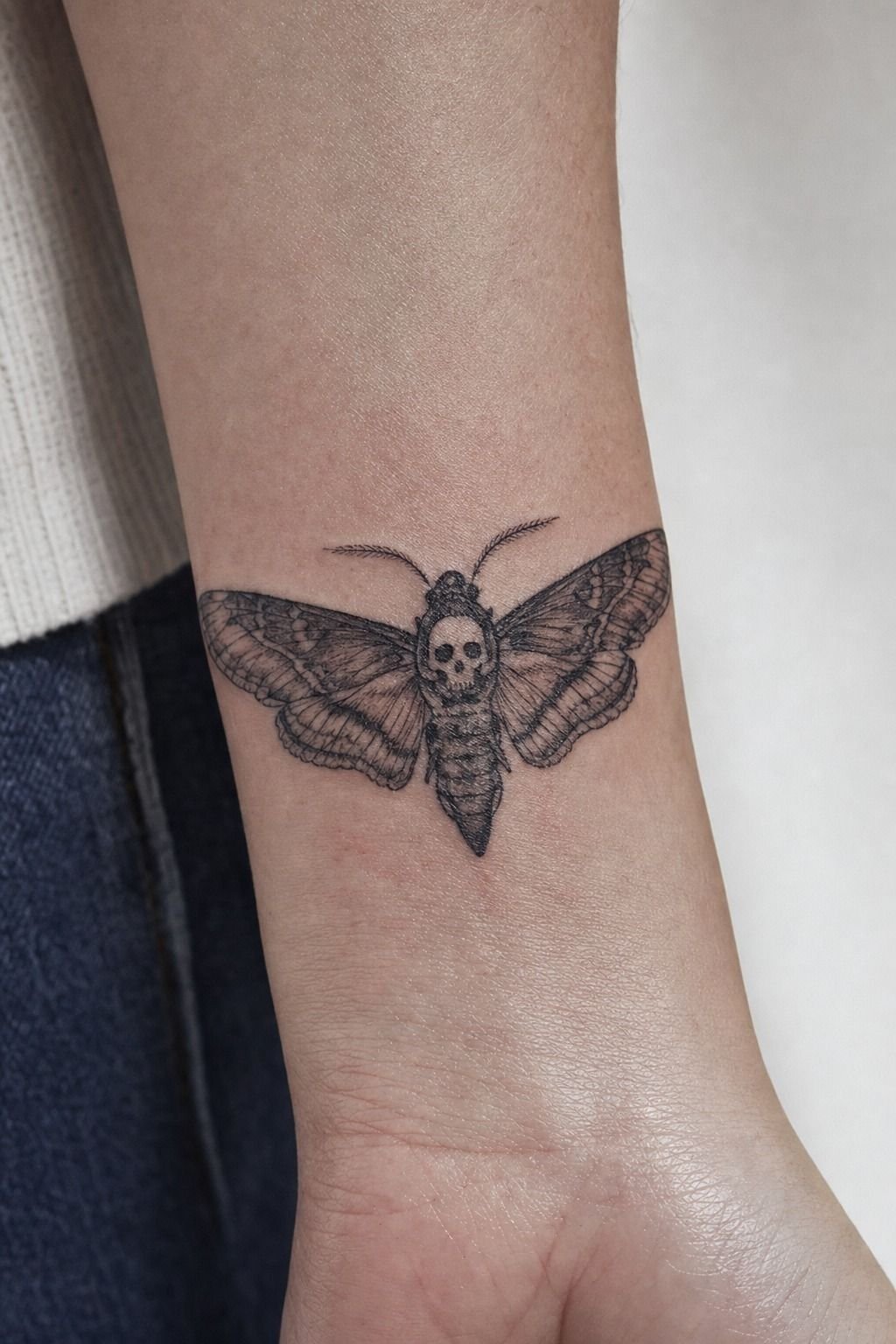 Death's-Head Geometry Keeps The Wings Symmetrical