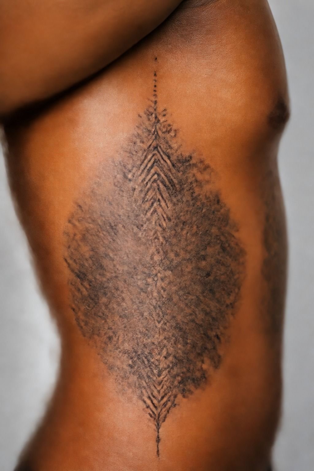 The rib blackwork placement I warn nervous clients about