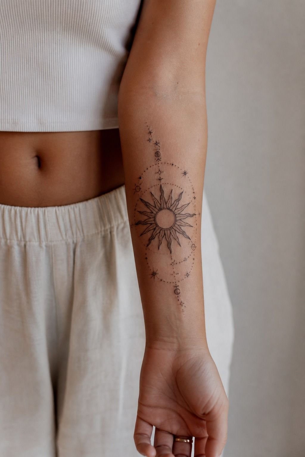 Celestial Sun Tattoo With Dotwork Accents