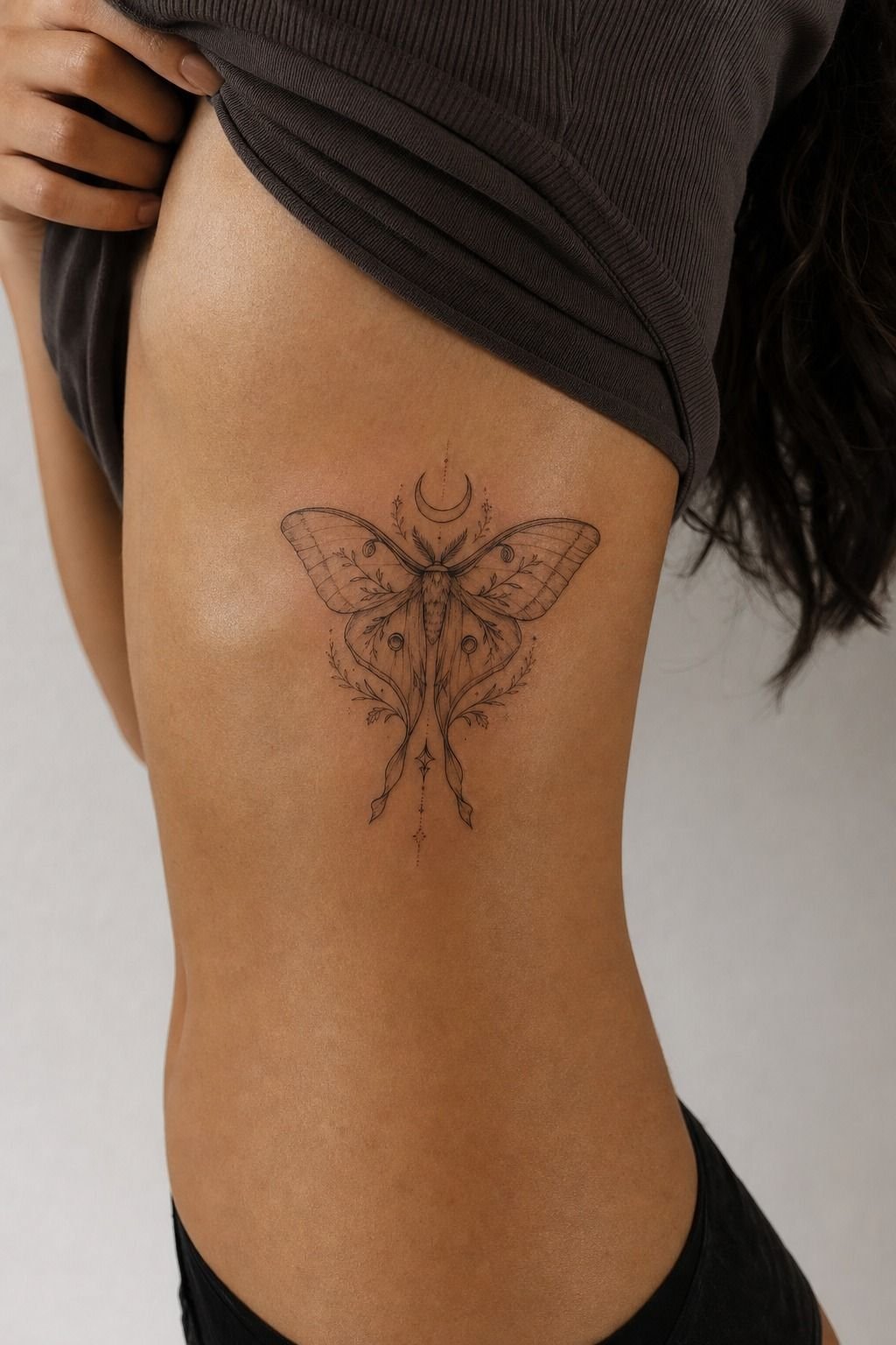 Lunar Moth Rib Tattoo Design