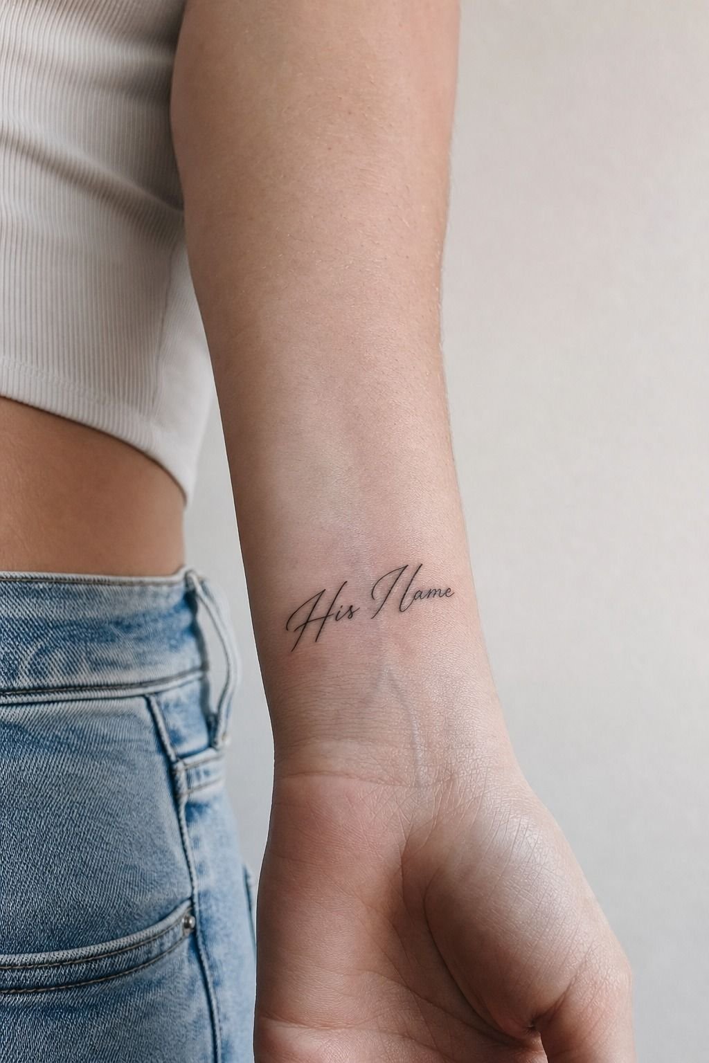 His Name in Fine-Line Script on Wrist