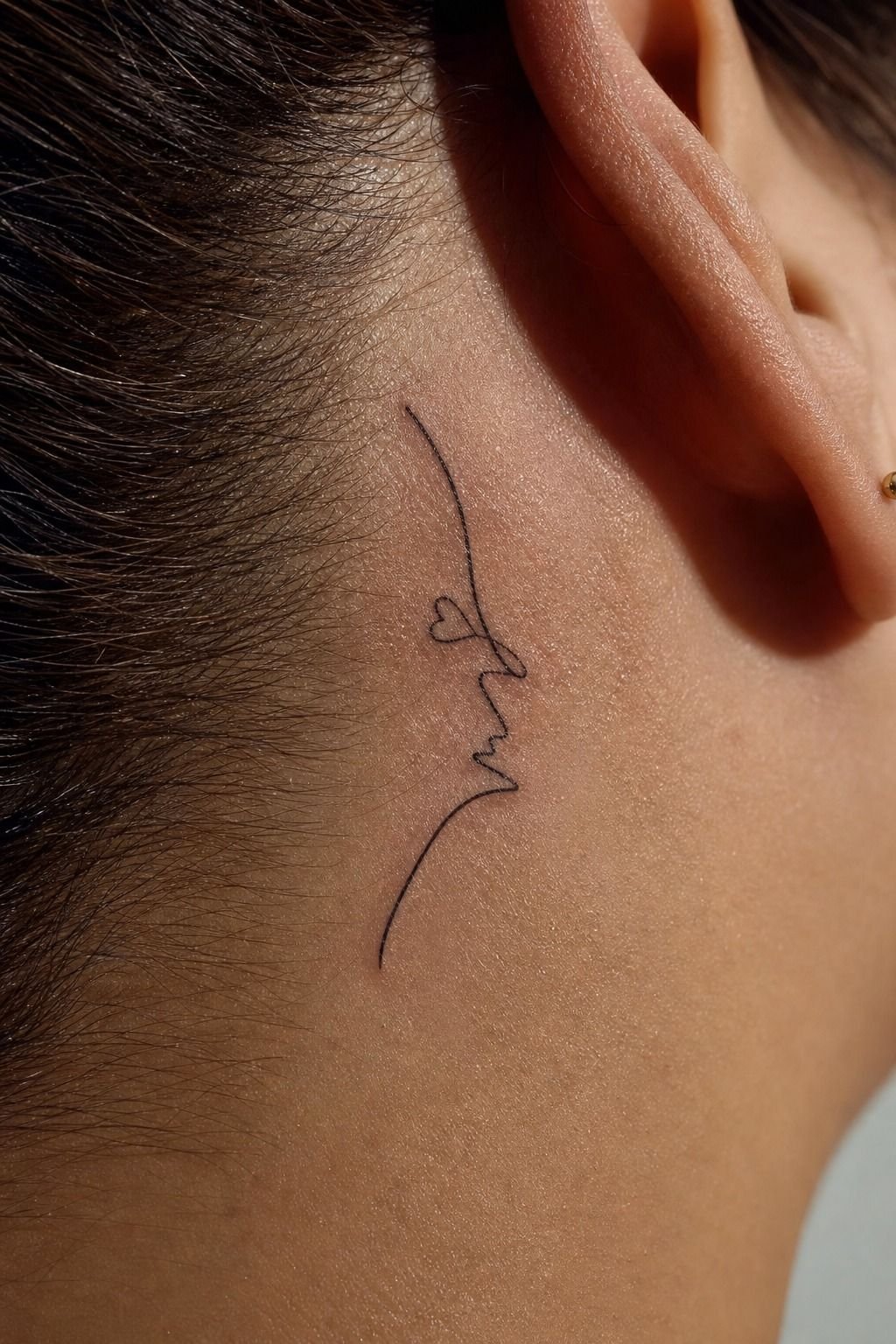 His Name Tattoo with a Tiny Heart