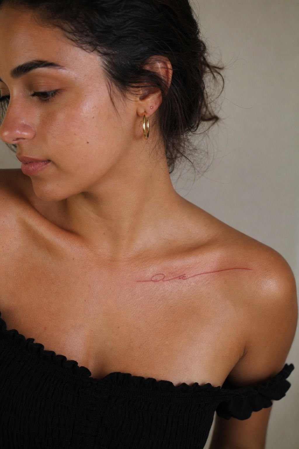 His Name Along the Collarbone in Red Ink