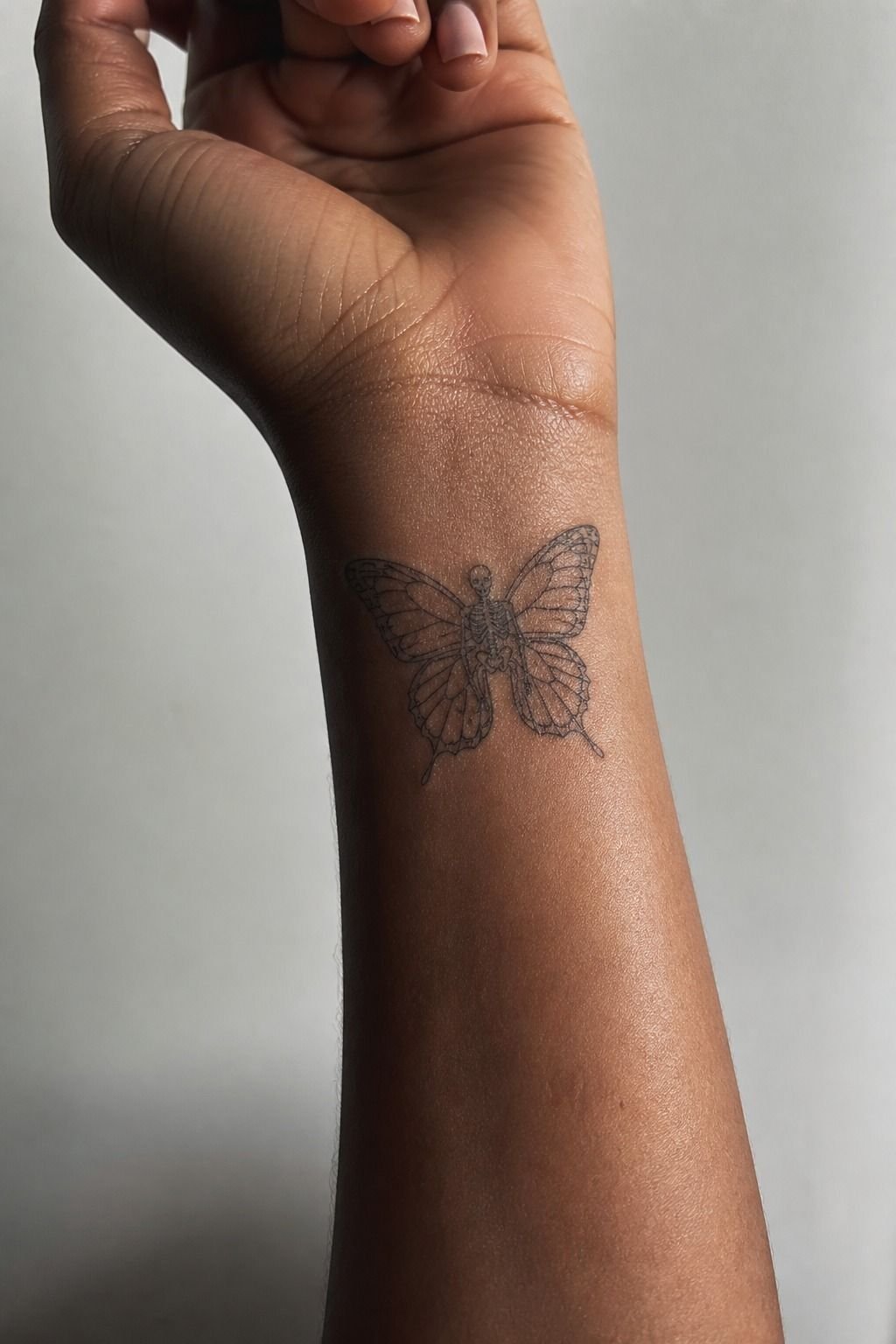 Skeleton Butterfly Tattoo With Fine Line Wings