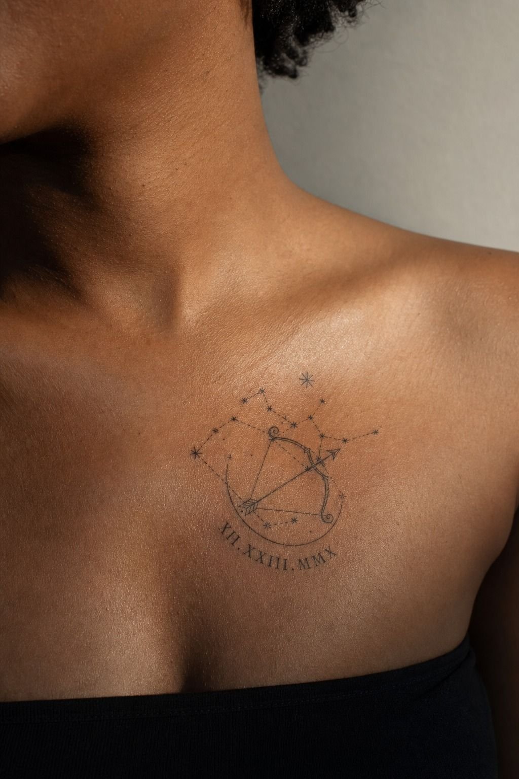 Sagittarius Chest Tattoo With Roman Numerals