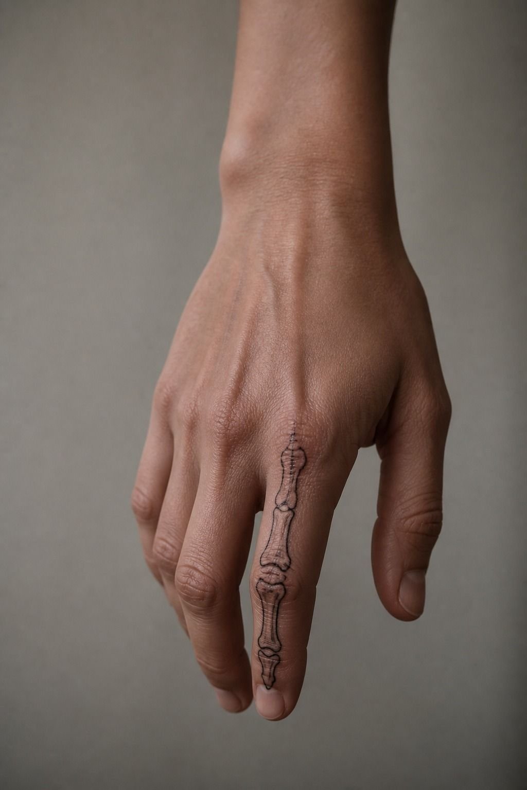Minimalist Skeleton Finger Tattoo For Women