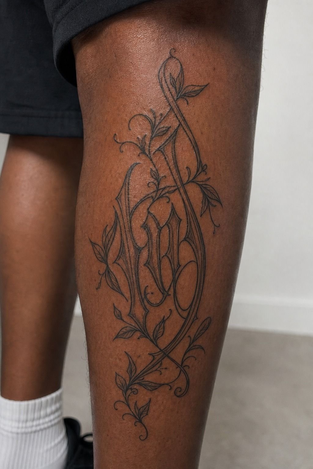 His Name Encircled by Fine-Line Vines