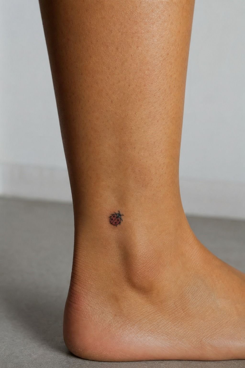 Minimalist Ladybug on the Ankle