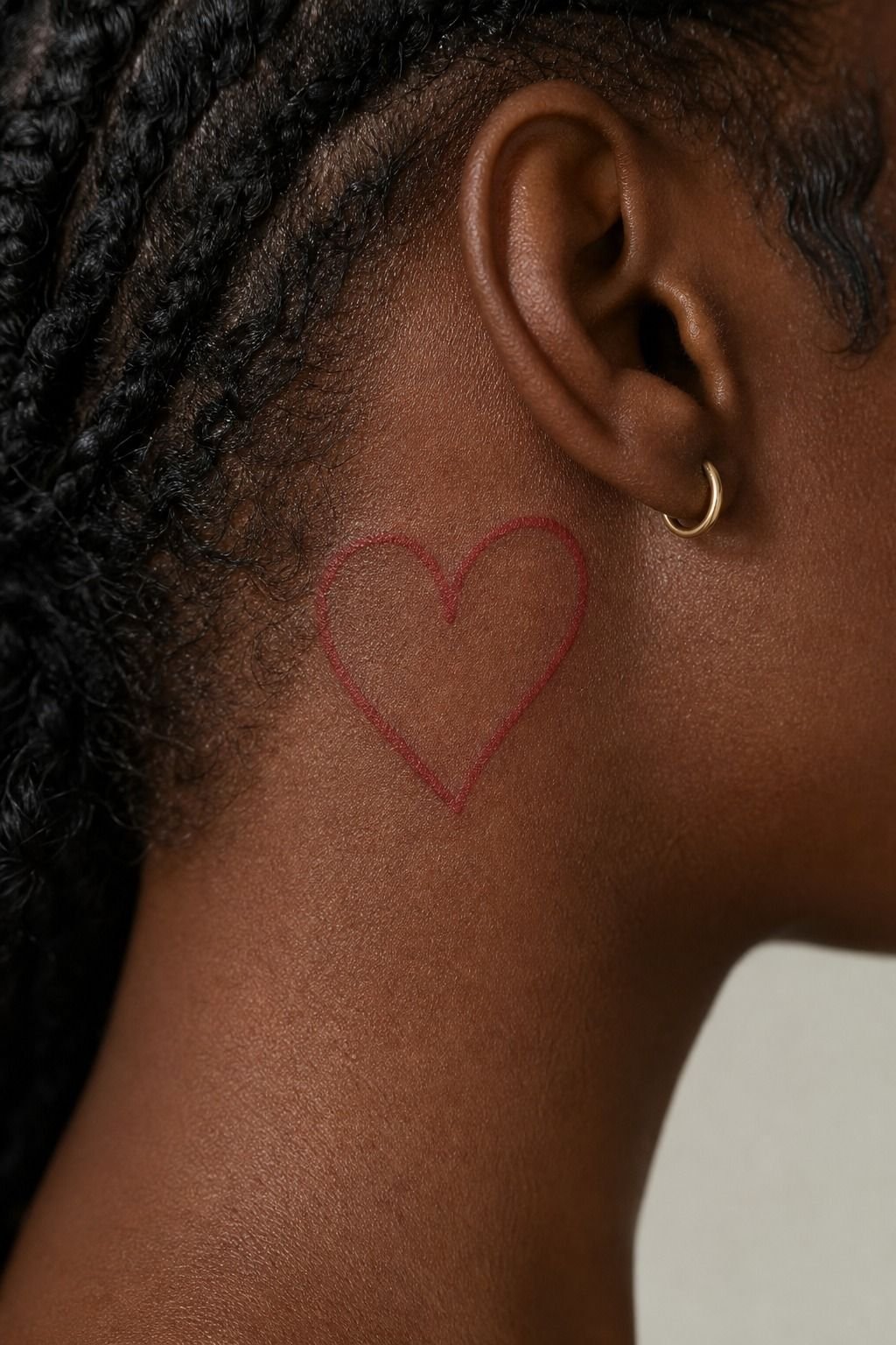 Dainty Red-Ink Heart Tattoos
