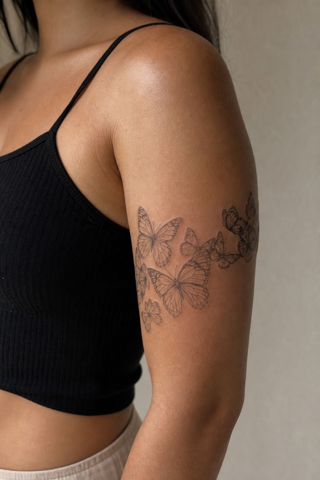 Plan Layered Butterflies Along the Upper Arm