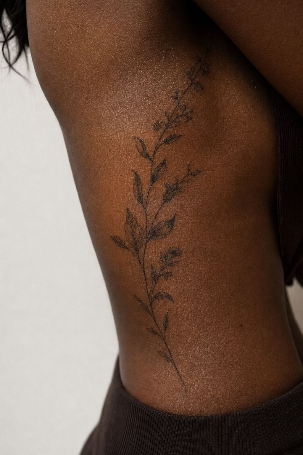 Delicate Botanical Side-Rib Tattoos