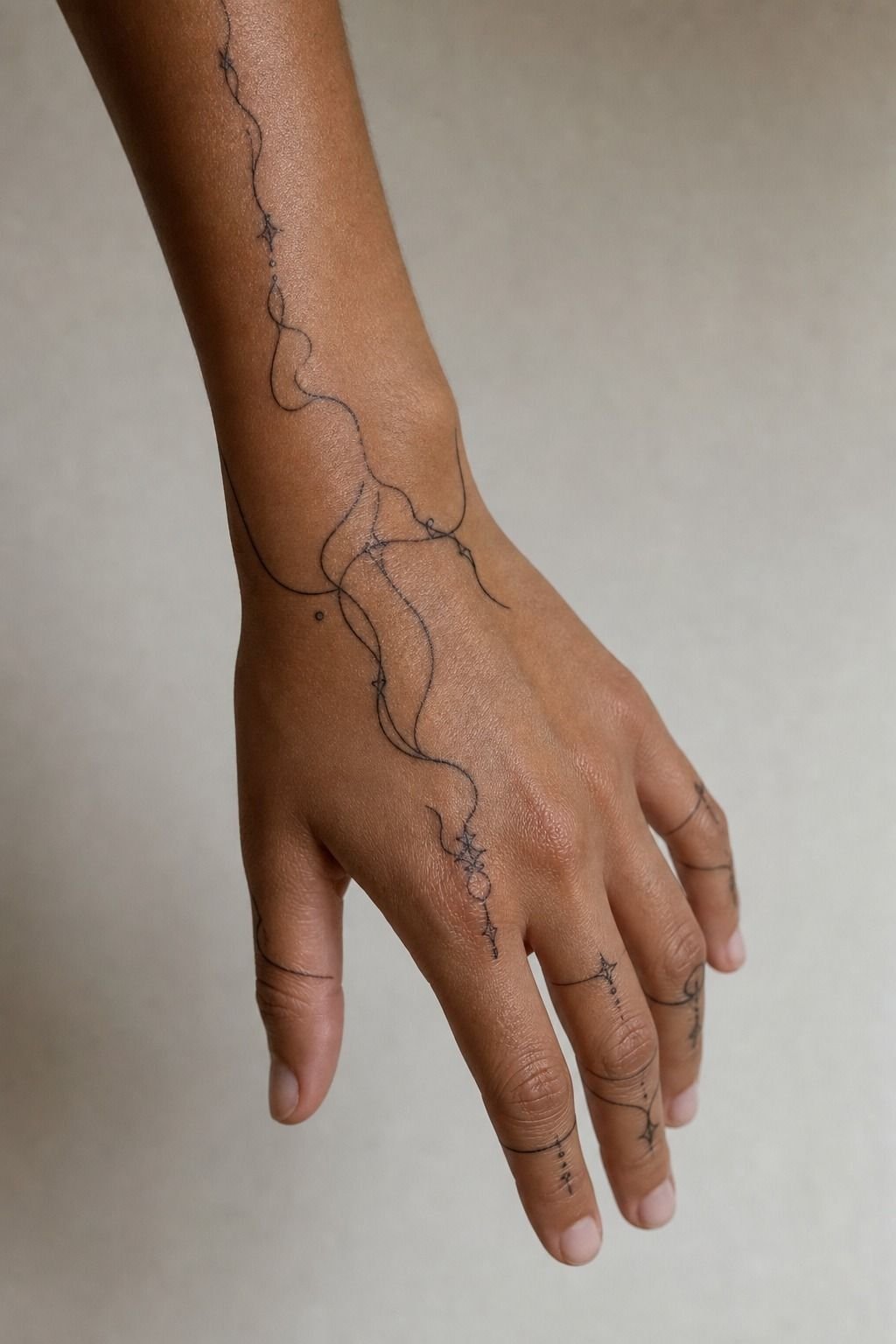 Minimalist Fine Line Hand Tattoos