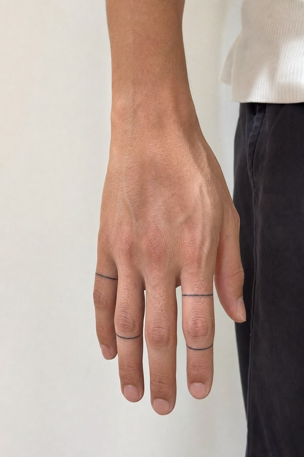 Fine Line Finger Ring Tattoos