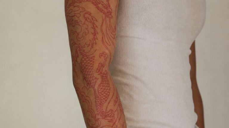 I Chose A Red Shoulder Tattoo, It Still Looks Crisp Years Later