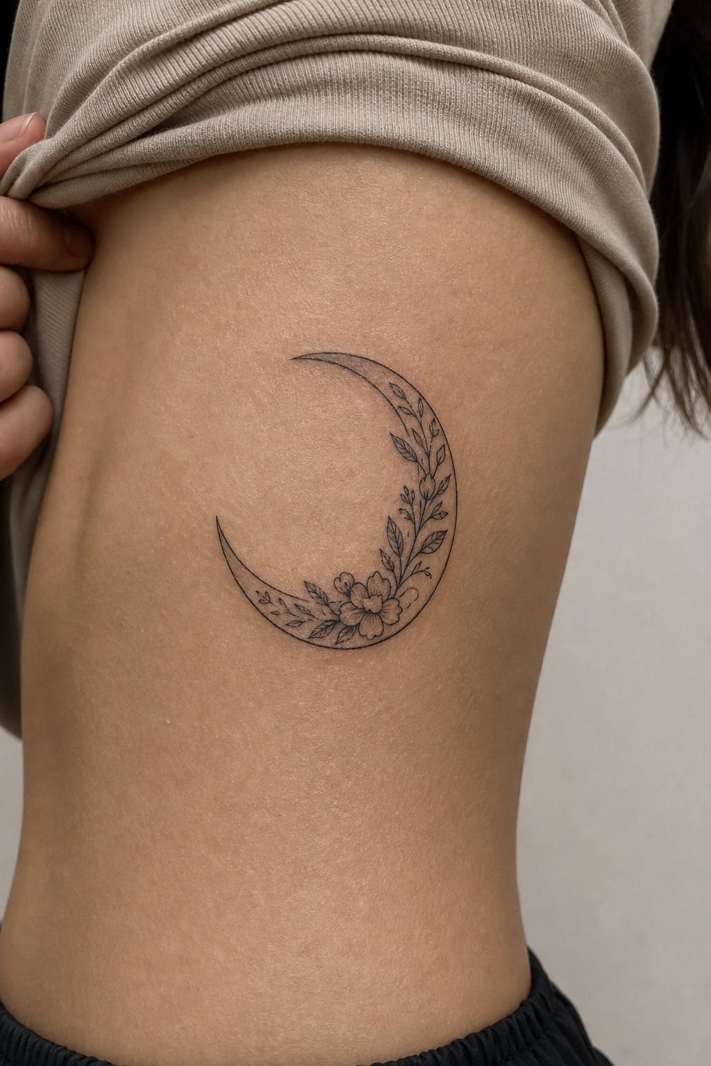 Dainty Crescent Moon Rib Tattoos