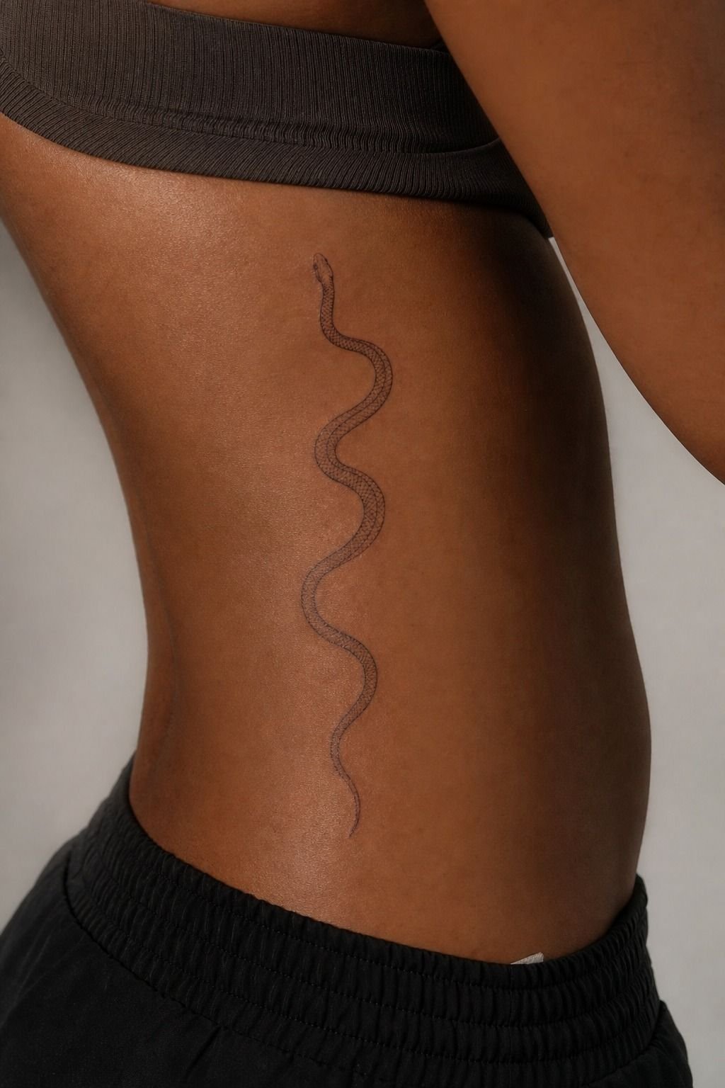 Fine Line Snake Wrapped Along the Rib