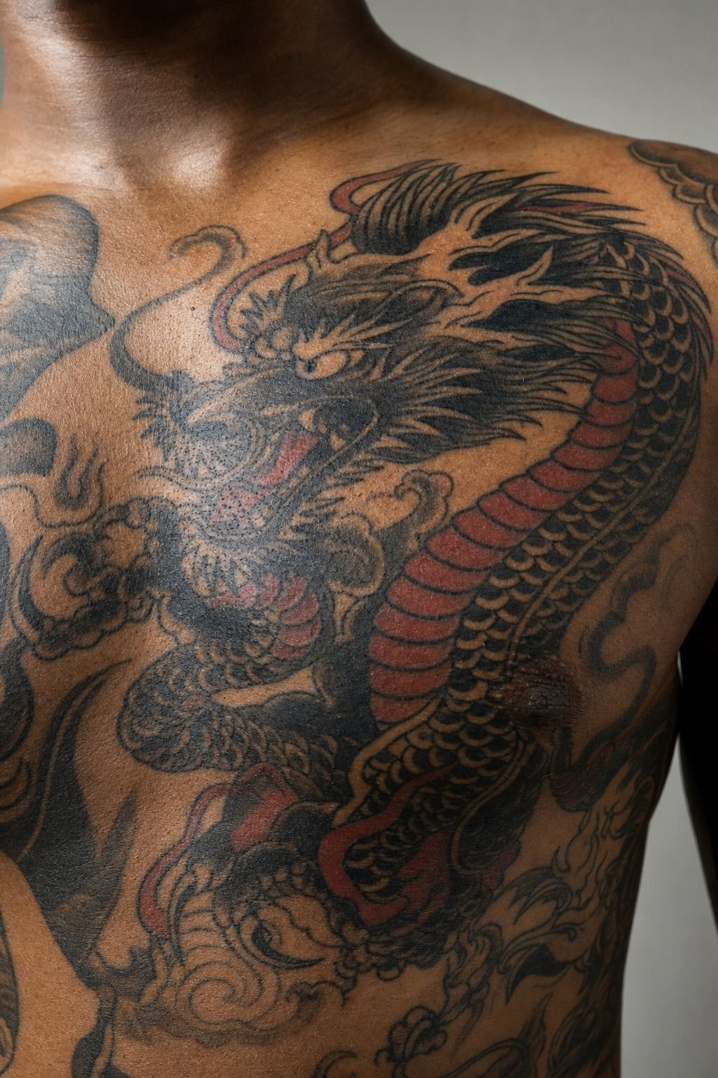 Traditional Dragon Chest Tattoo Design