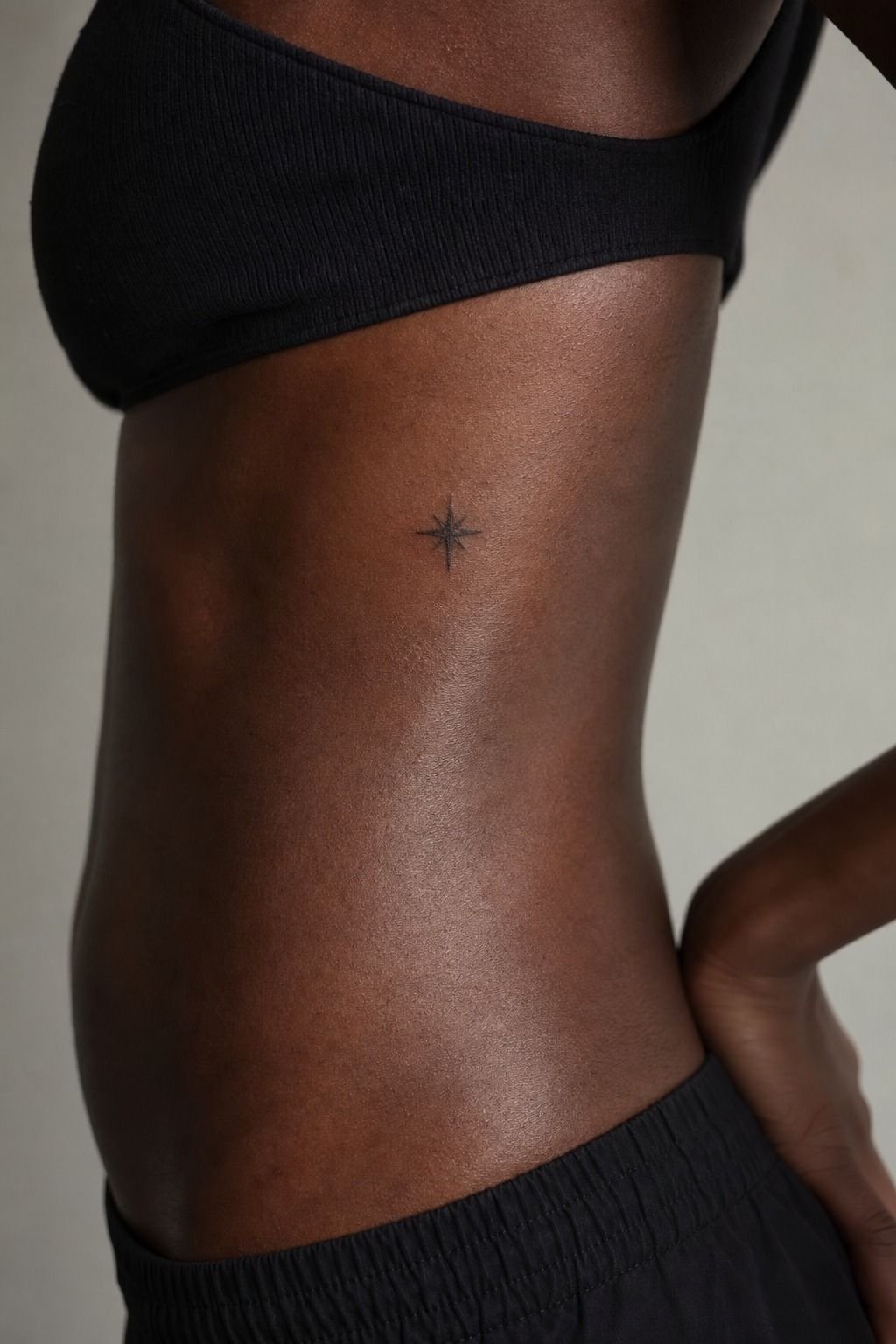 Small Blackwork Star on the Ribcage