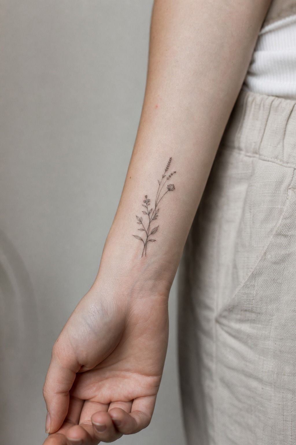 Fine Line Botanical Wrist Tattoos