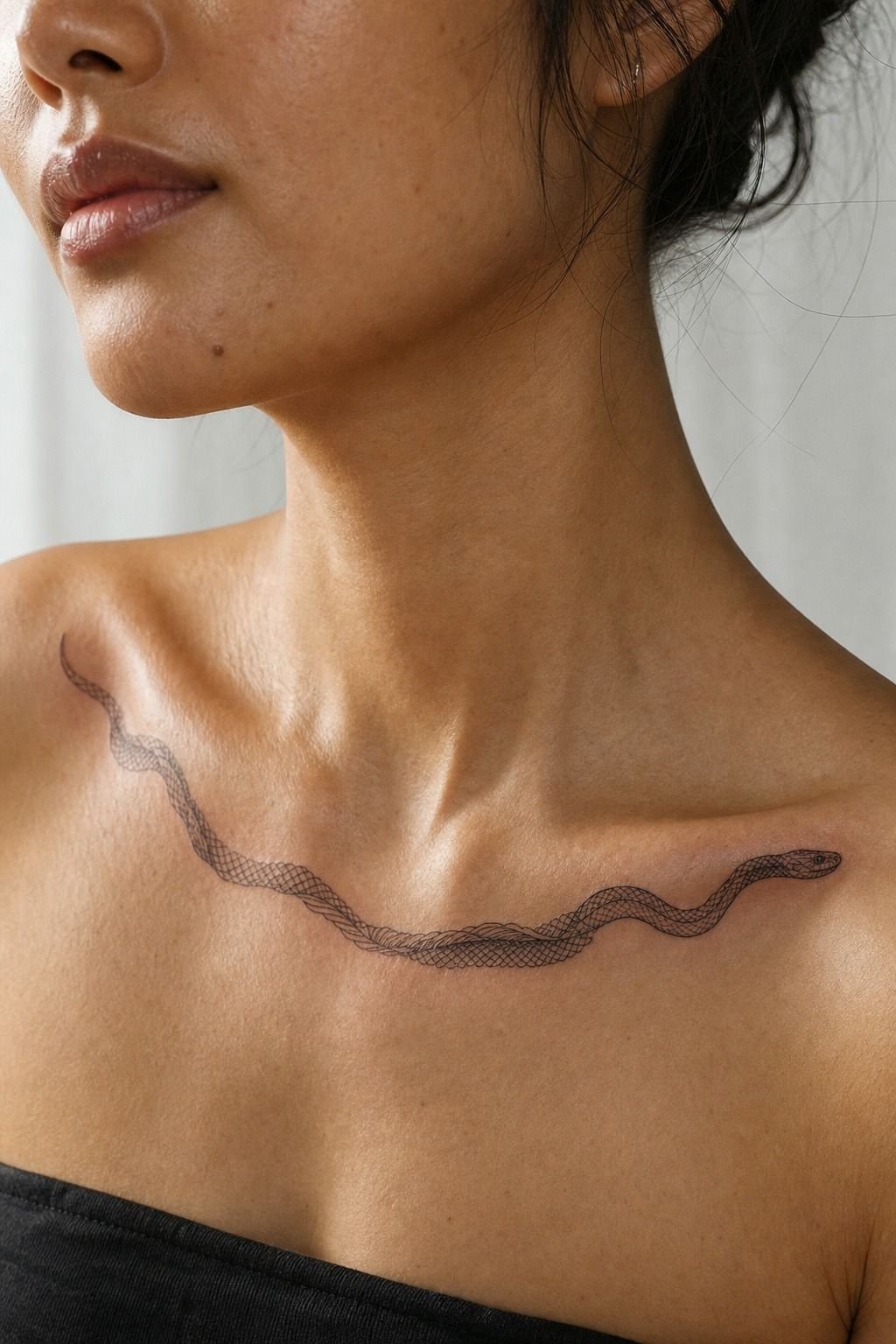 Snake Shedding Skin Along the Collarbone