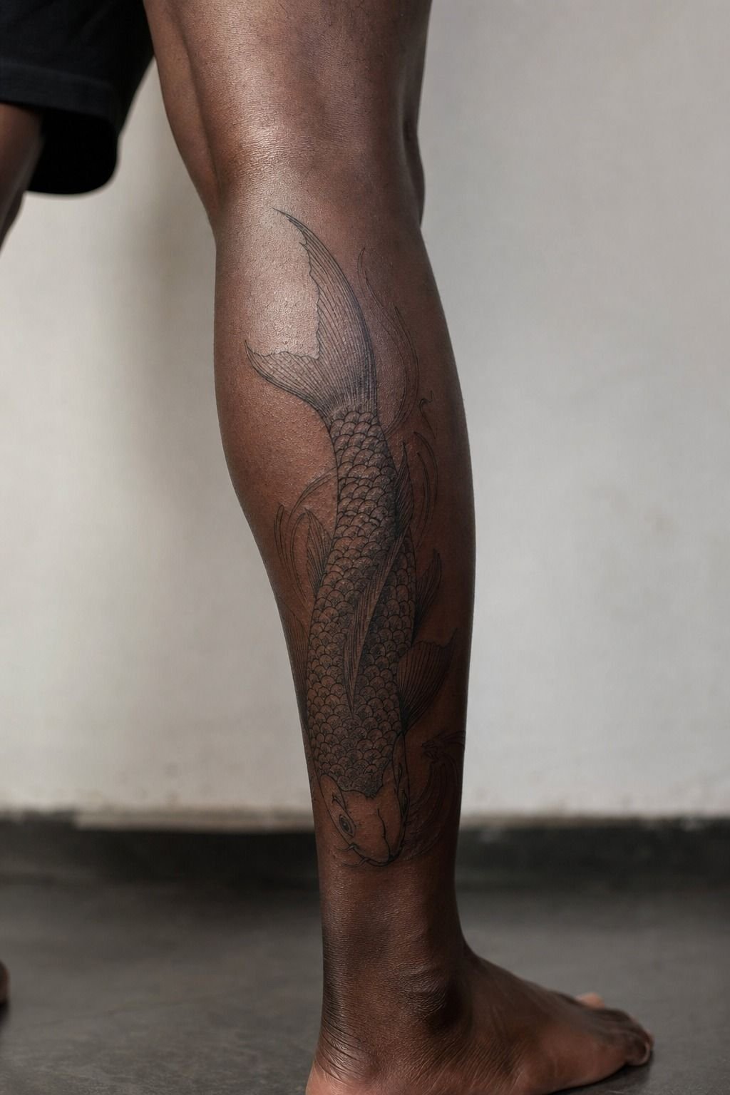Tebori Koi Swimming Upstream on the Calf
