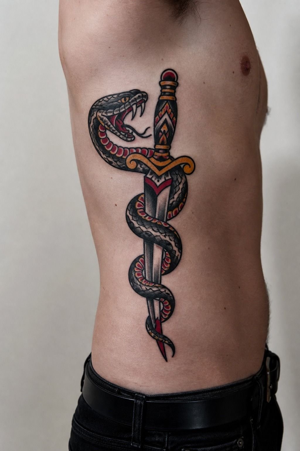 Modern Traditional Snake and Dagger Tattoo