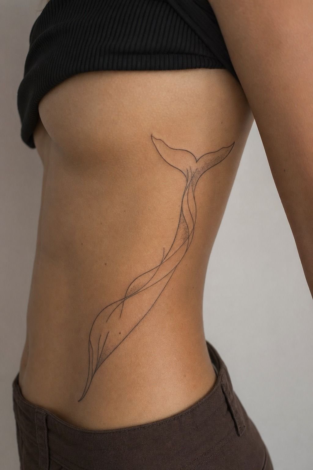 Use Rib Flow for a Whale Tail Tattoo
