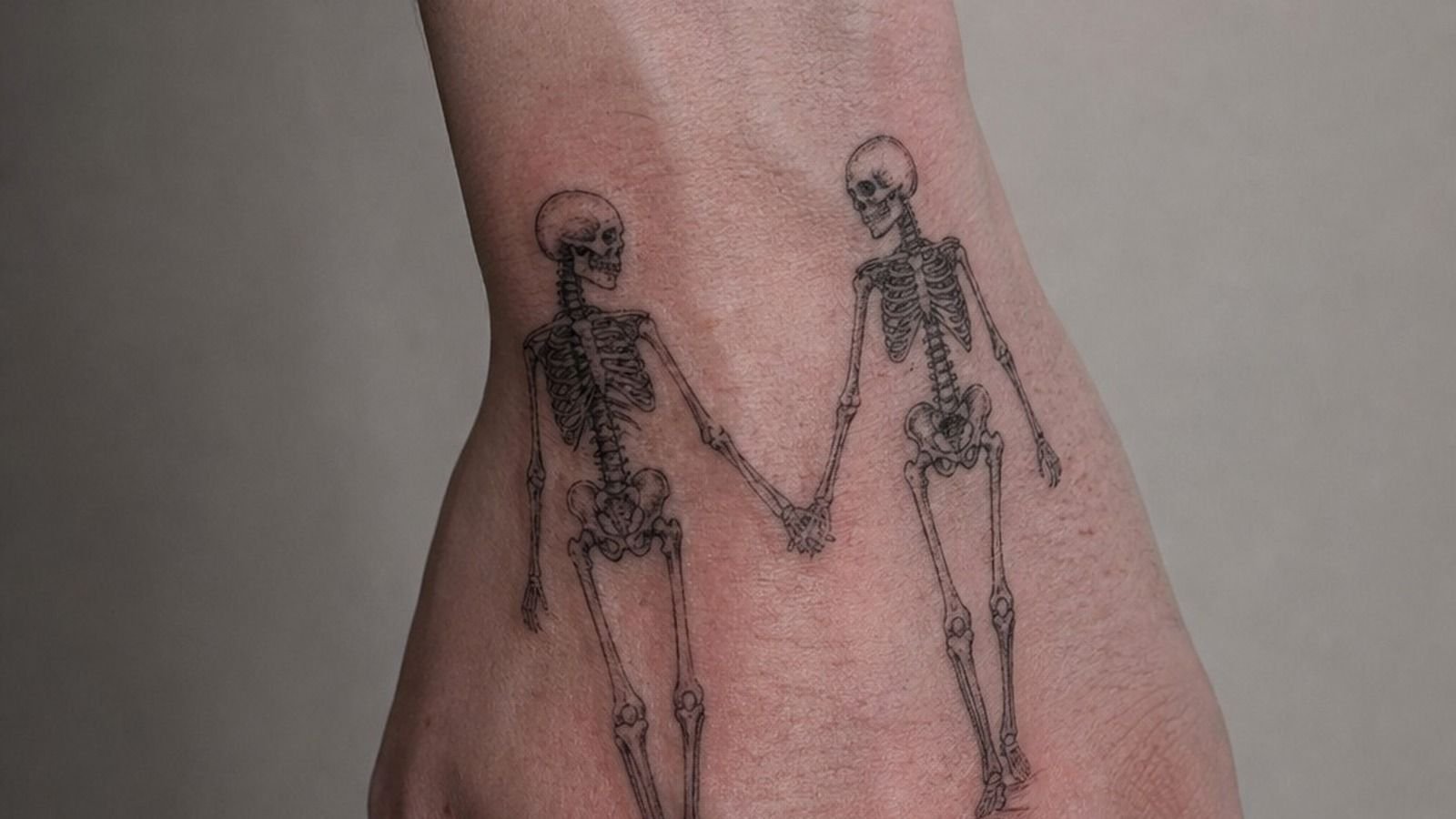 I Chose a Two Skeletons In Love Tattoo, It Still Feels Personal