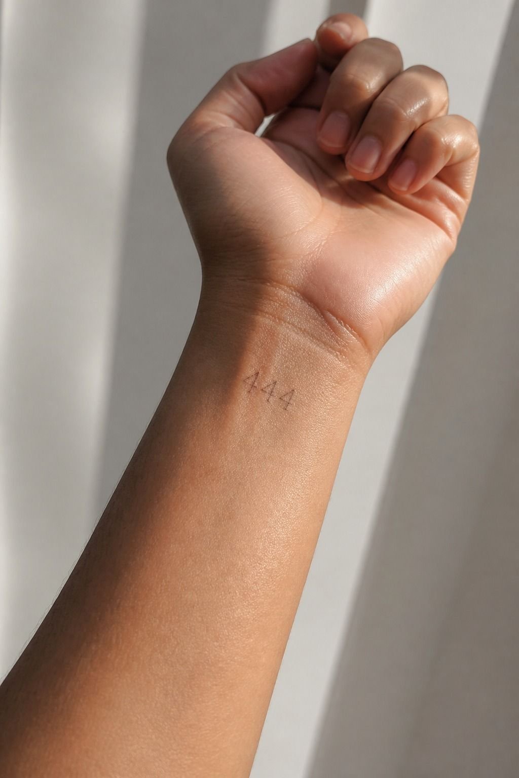 Fine-Line Angel Number Front Wrist Tattoo