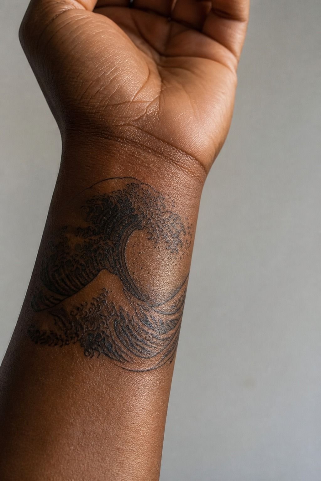 Meaningful Wave Front Wrist Tattoo