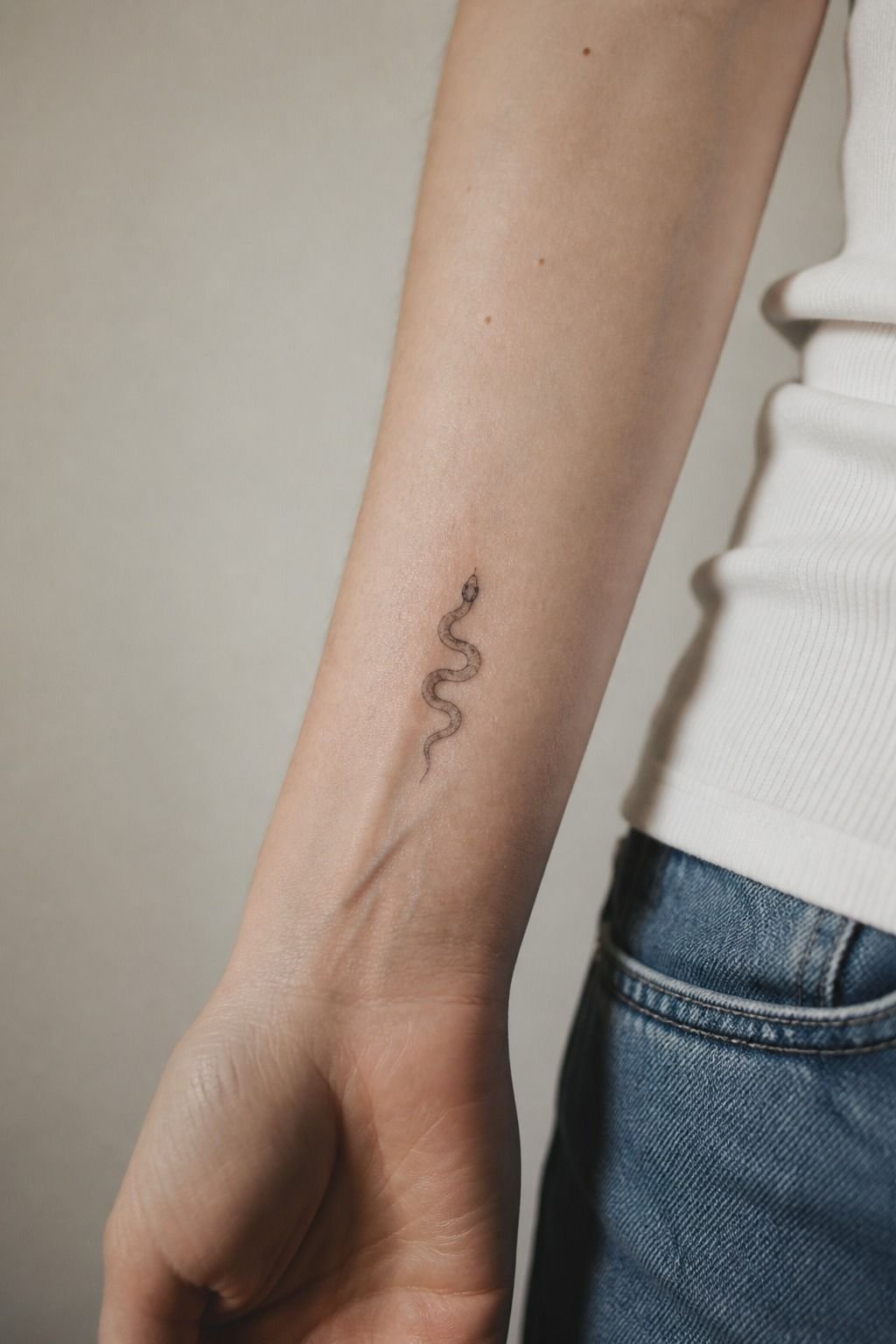 Upper Front Wrist Snake Tattoo