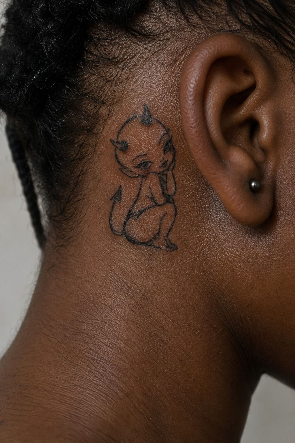 I Designed A Small Devil Behind My Ear