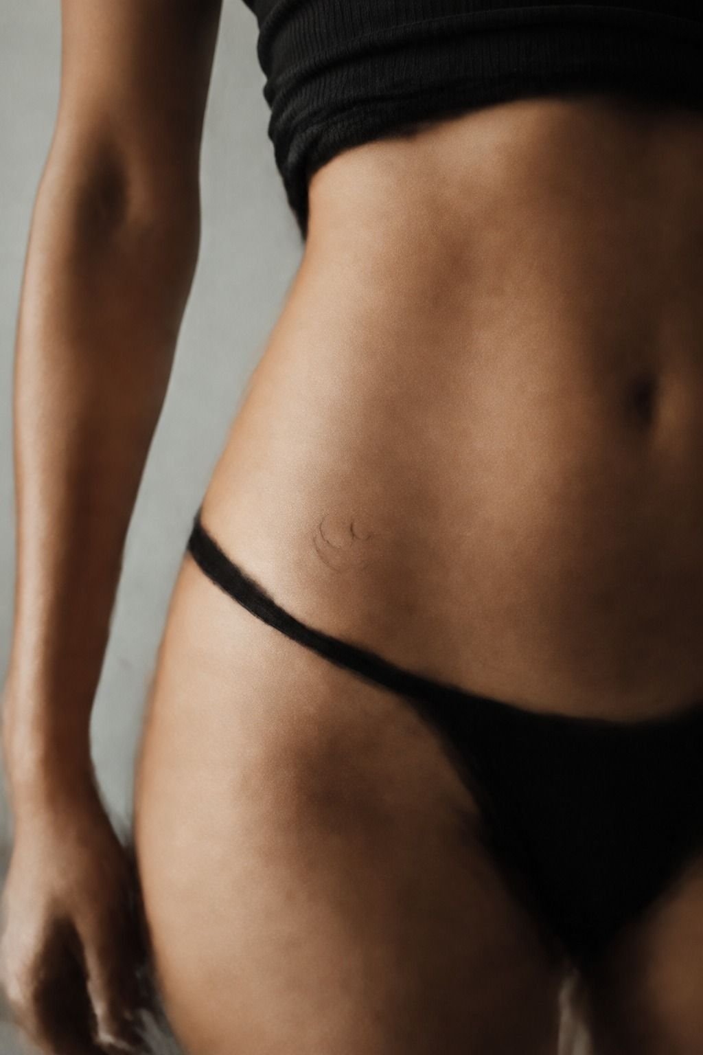 Minimalist Crescent Moon Along The Hip Bone