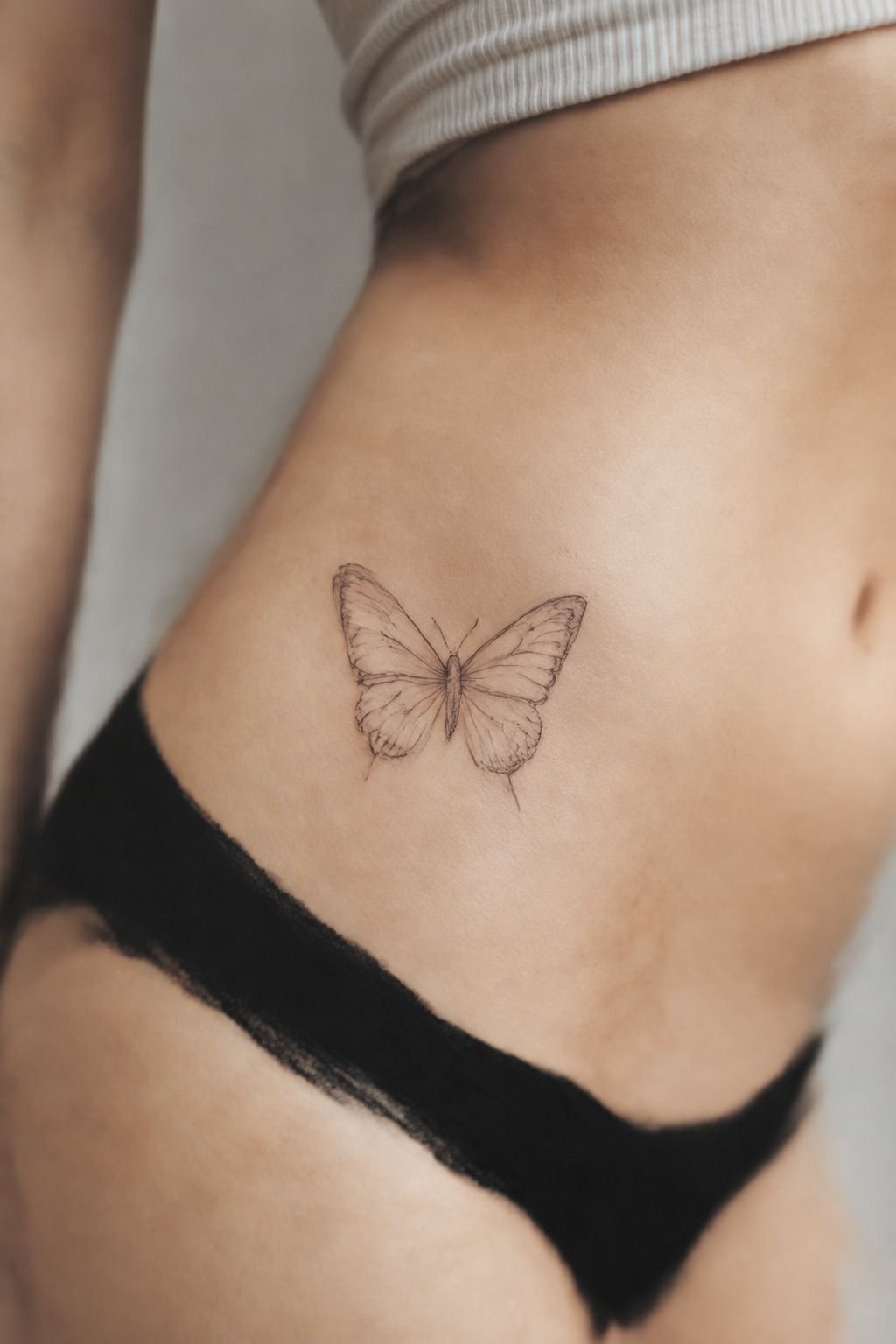 Dainty Butterfly Hip Bone Tattoo For Women