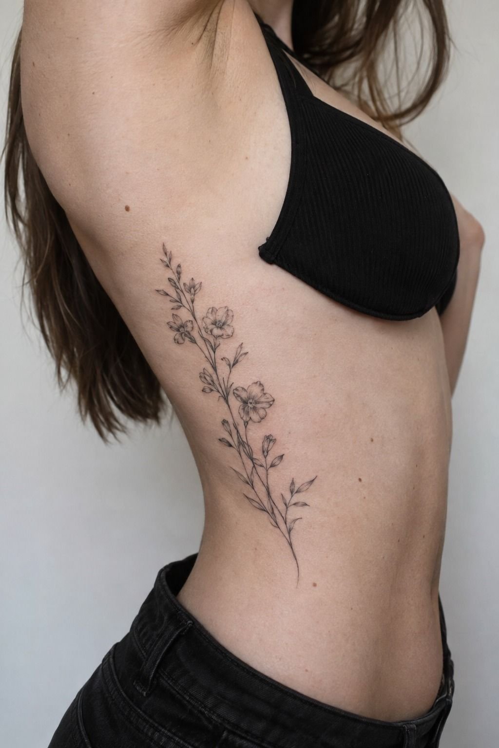 Fine Line Floral Rib Cage Tattoos: The One-Pass Line Rule