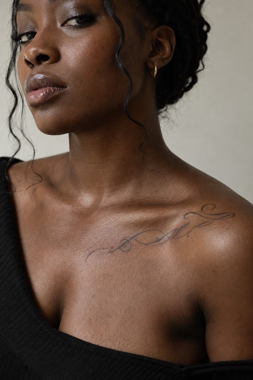 Flowing Cursive Fonts on the Collarbone