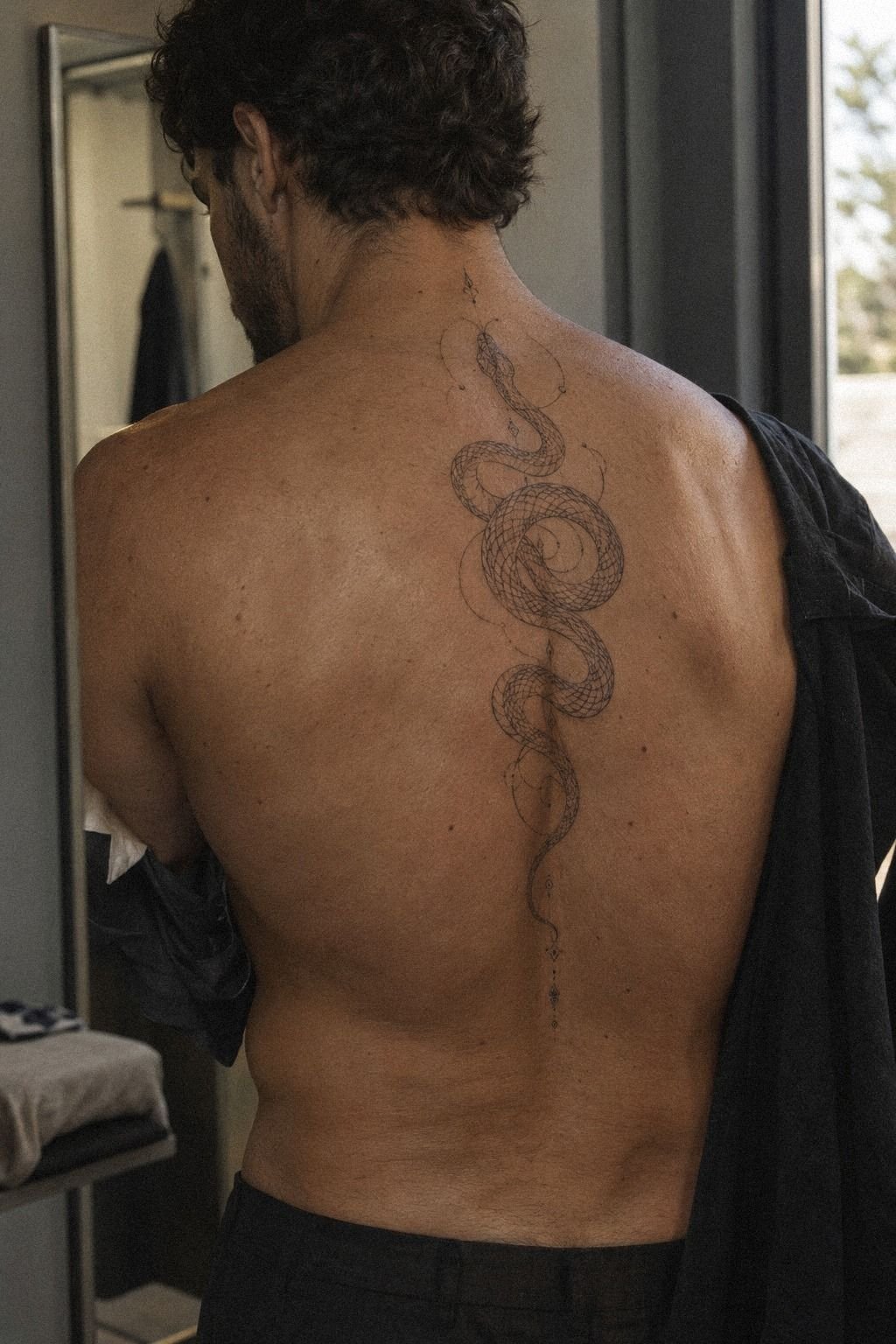 Trace an Ornate Snake Along the Back Ribs