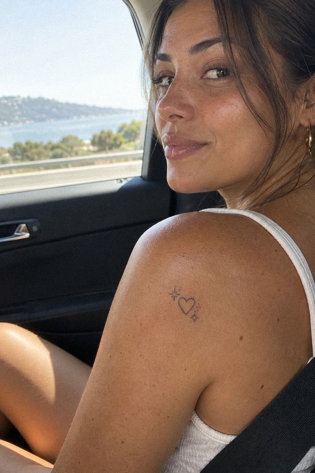 Cute Heart Shoulder Tattoo With Sparkling Details