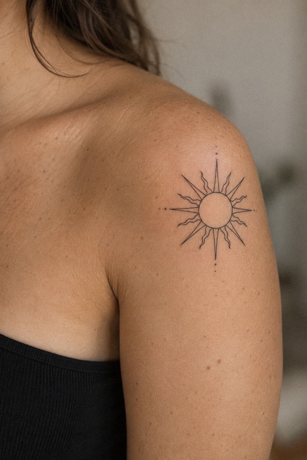 Start Small: A Minimal Sun Line Tattoo on the Wrist